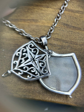 Magnified Glass Shield Pendant