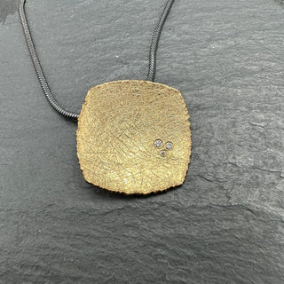 Offset Gold Pendant with Diamonds
