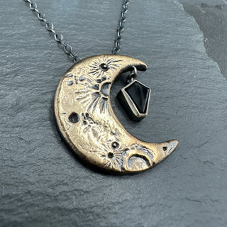 Spooky Sapphire Moon Pendant