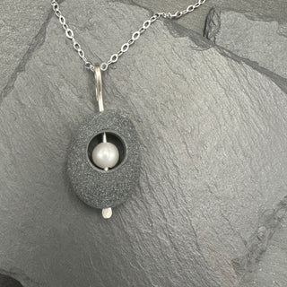 Hollowed Pearl in Stone Pendant