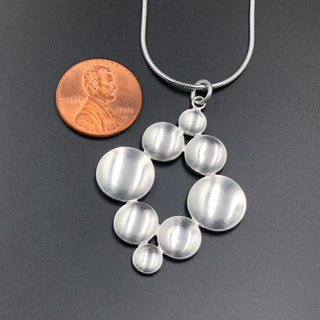 Parabolic Disc Open Square Necklace